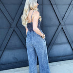 Mineral Washed Smocked Jumpsuit In Denim - Infinity Raine