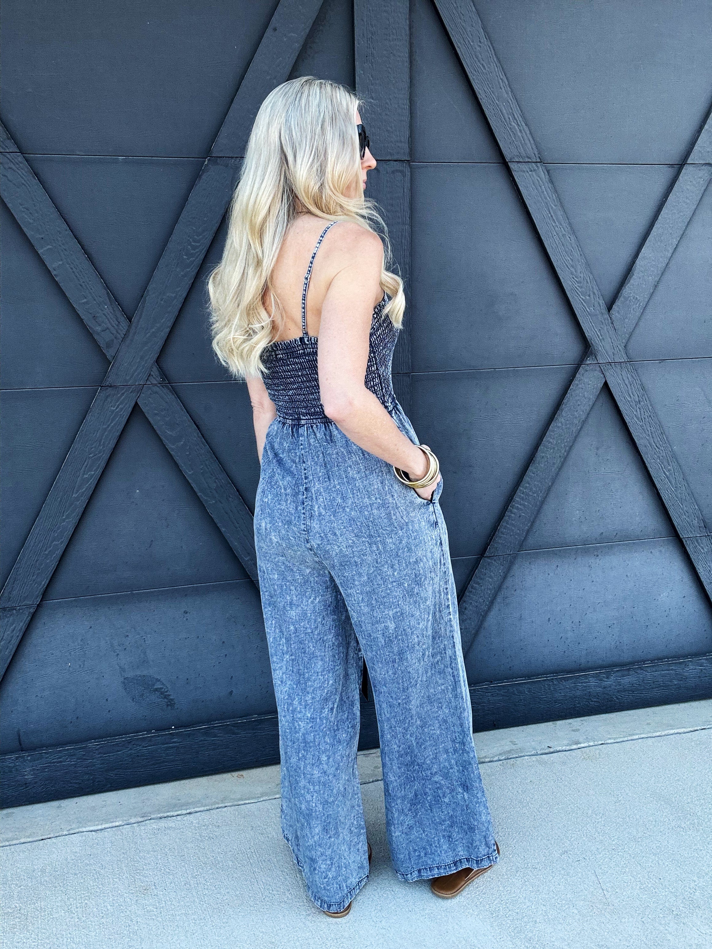 Mineral Washed Smocked Jumpsuit In Denim - Infinity Raine