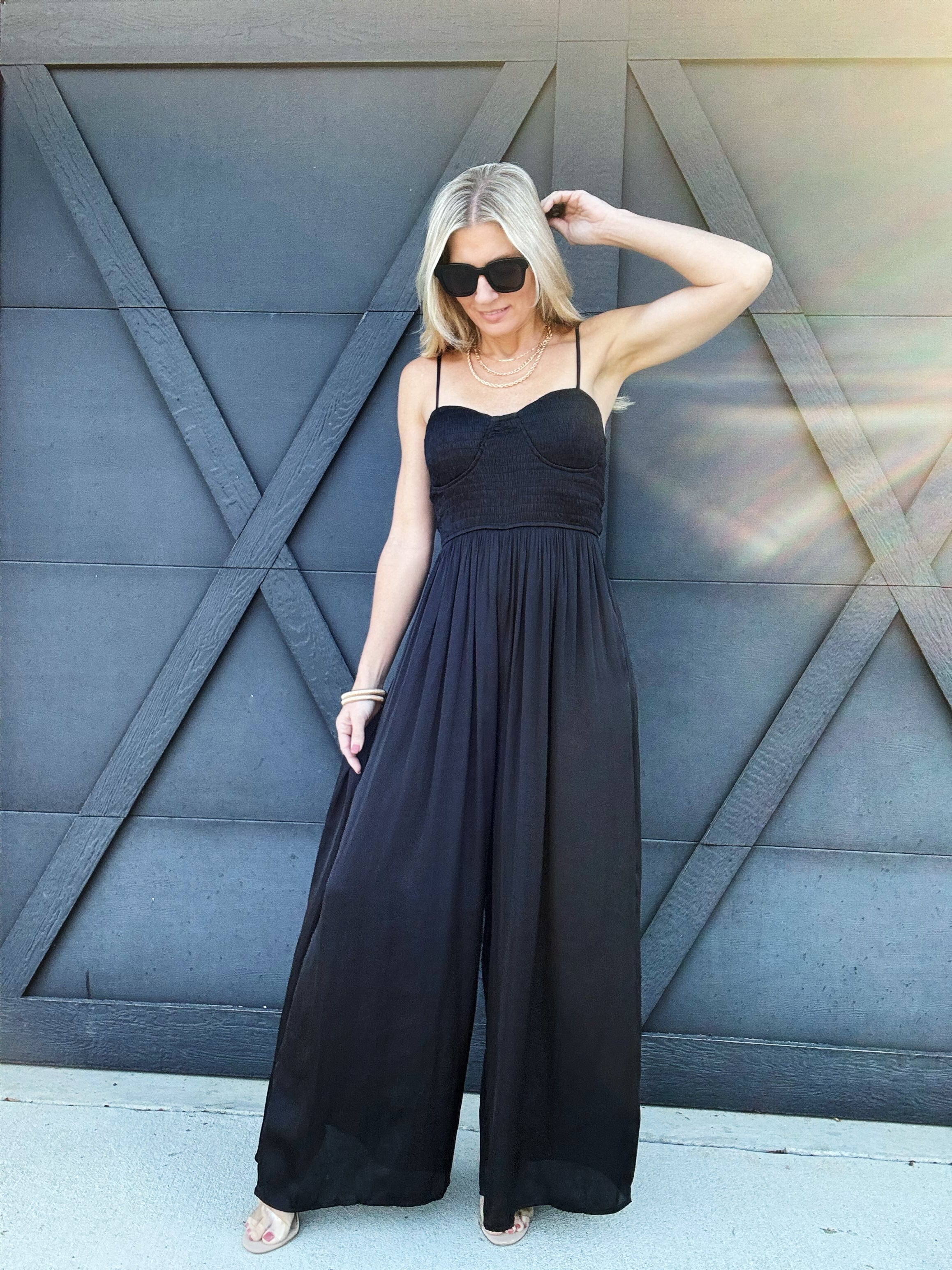 Mable Jumpsuits & Rompers Solid Satin adjustable spaghetti strap smocked bust wide leg jumpsuit in Black