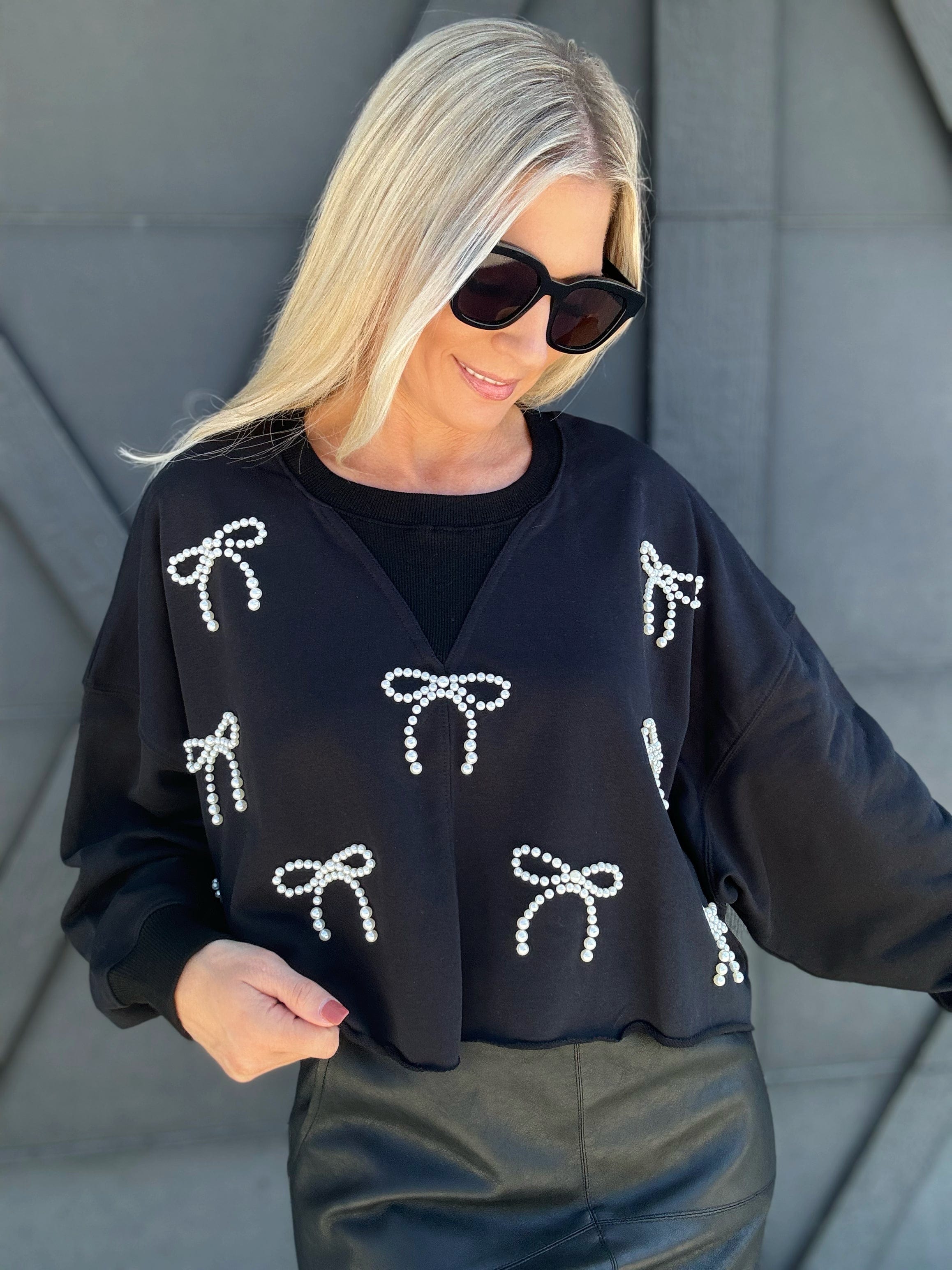 Cropped Pearl Bow Sweatshirt In Black - Infinity Raine