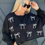 Cropped Pearl Bow Sweatshirt In Black - Infinity Raine