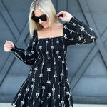 Bow Ribbon Print Woven Dress In Black - Infinity Raine