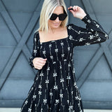 Bow Ribbon Print Woven Dress In Black - Infinity Raine