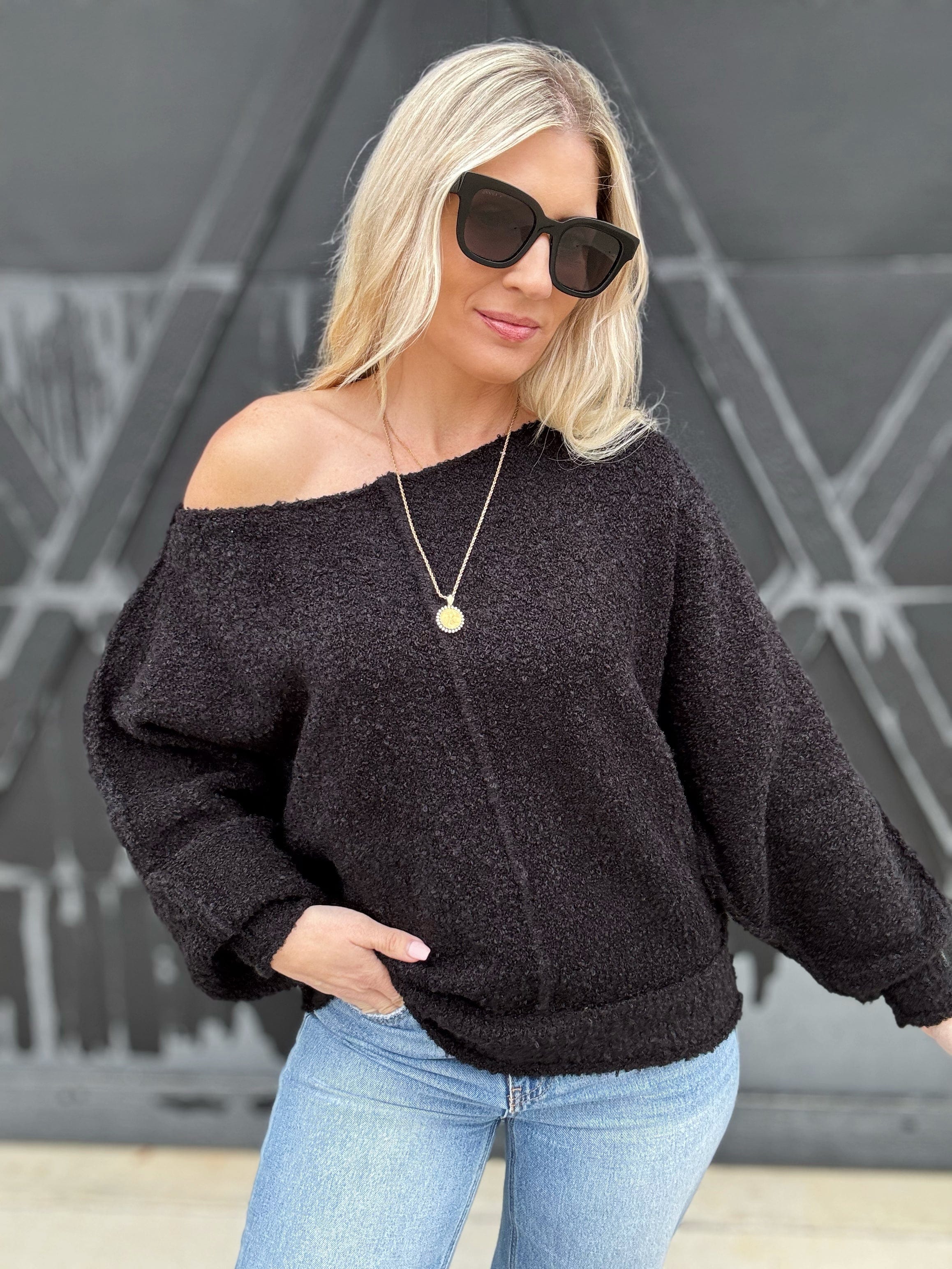 Loose Fit Exposed Seam Boucle Sweater In Black - Infinity Raine