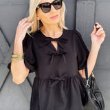 Bowknot Peplum Blouse In Black - Infinity Raine